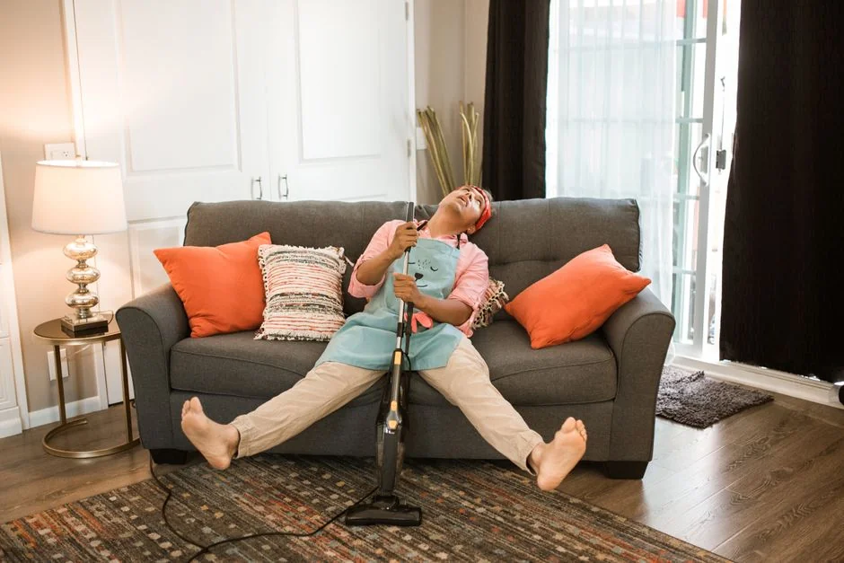 Vacuum and tools in a room undergoing renovation, showcasing home improvement.